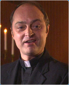<b>Ron Bottitta</b> as Priest